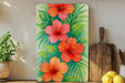 a painting of red flowers on a green background