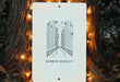 a sign that is hanging on a tree