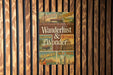a wooden wall with a sign on it