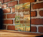 a sign on a brick wall that says wanderlust and wonder