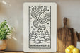 a picture of a tarot card sitting on a shelf