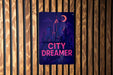 a sign on a wooden wall that says city dreamer