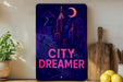 a picture of a city with the words city dreamer on it