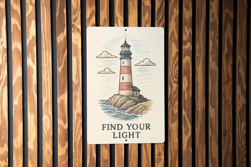 a sign on a wooden wall that says find your light