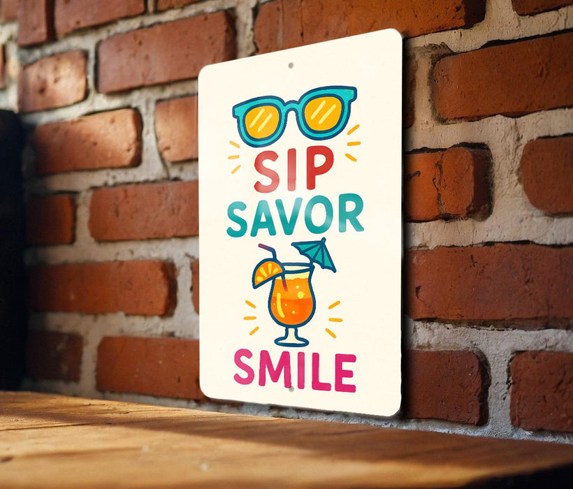 a sign on a brick wall that says sip savor smile