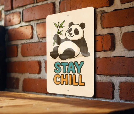 a sign that says stay chill on a brick wall