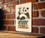 a sign that says stay chill on a brick wall