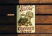 a sign that says time to slow coffee's fast
