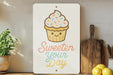 a sign that says, sweeten your day