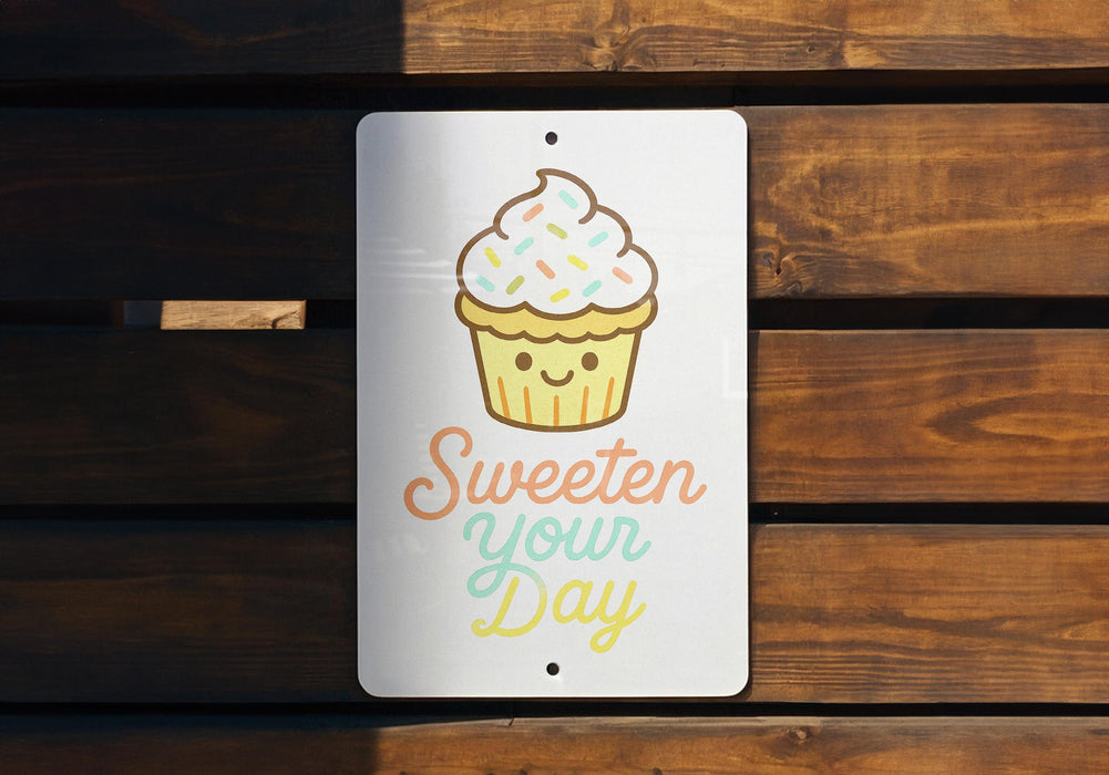 a sign that says sweeter your day with a cupcake on it
