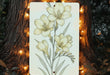 a painting of yellow flowers on a white board