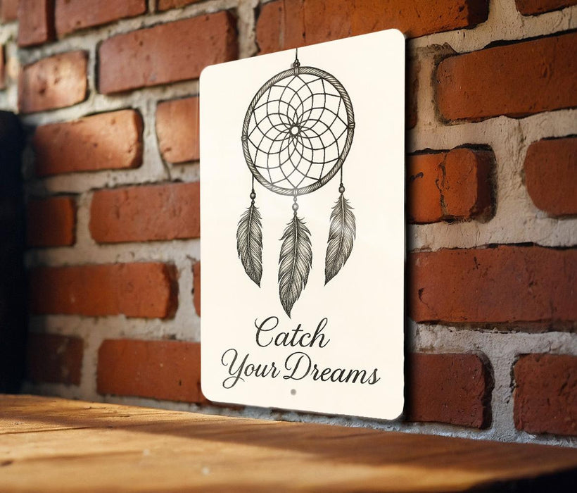 a sign that says catch your dreams on a brick wall