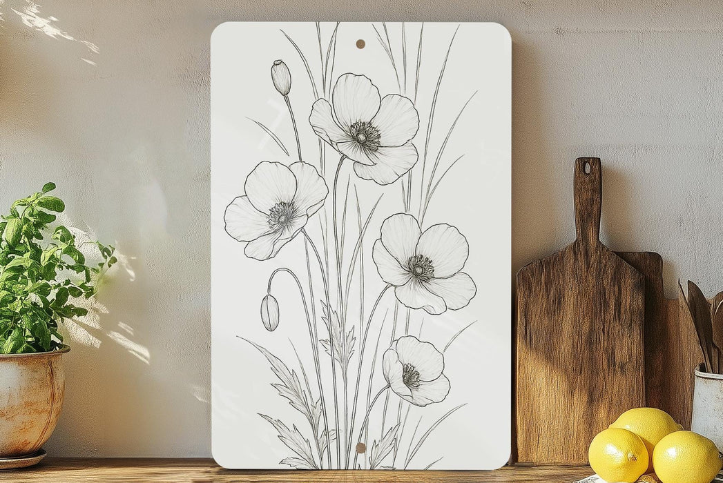 a cutting board with flowers on it next to a potted plant