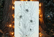a drawing of flowers on a white board