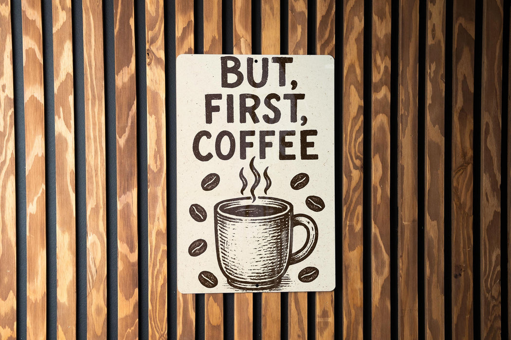 a sign on a wooden wall that says, but first, coffee