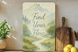 a sign that says find your flow next to some lemons