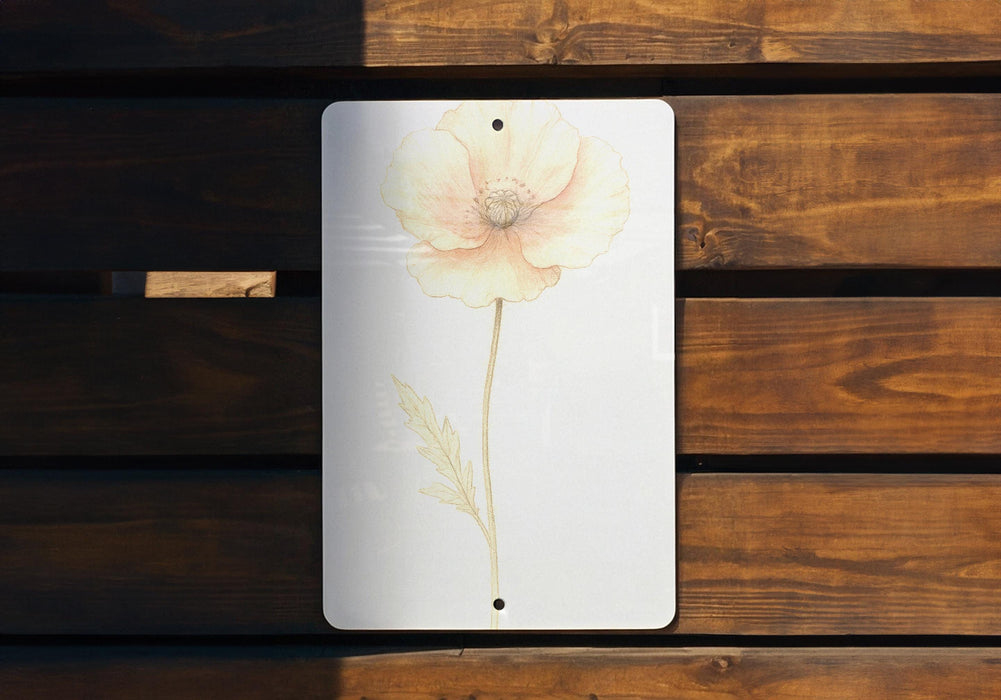 a picture of a flower on a white plaque