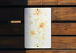 a picture of a flower painted on a piece of wood