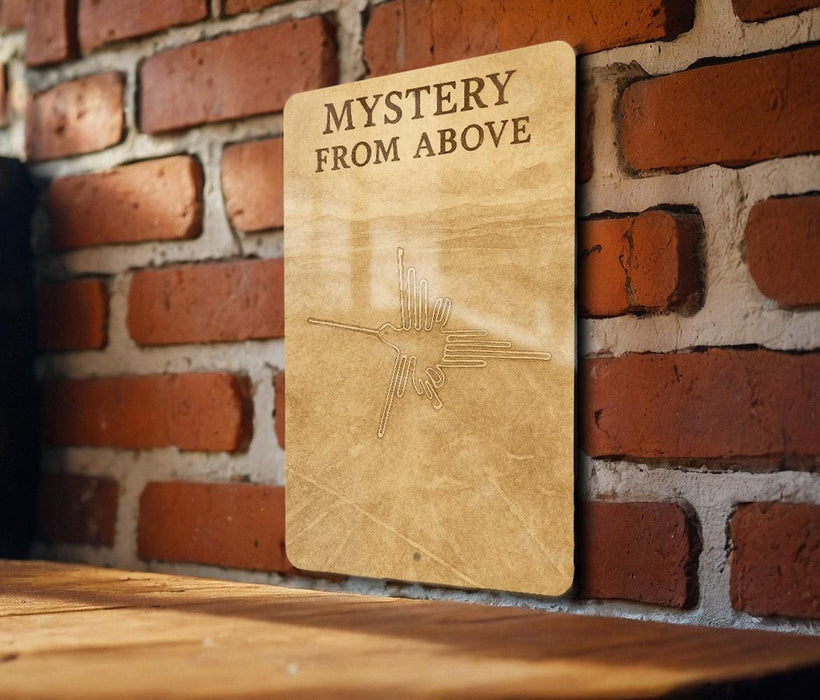 a sign on a brick wall that says mystery from above
