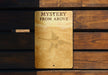 a wooden sign that says mystery from above