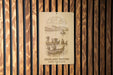 a sign on a wooden wall that says highland waters