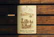 a wooden bench with a sign on it