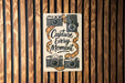a sticker on a wooden wall that says capture every moment