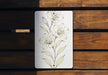 a picture of some flowers on a wooden bench