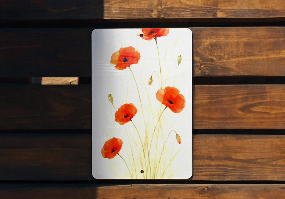 a picture of some red flowers on a wooden bench