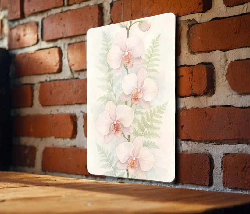 a picture of a pink flower on a brick wall