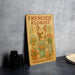 a frenchie florist sign sitting on a table