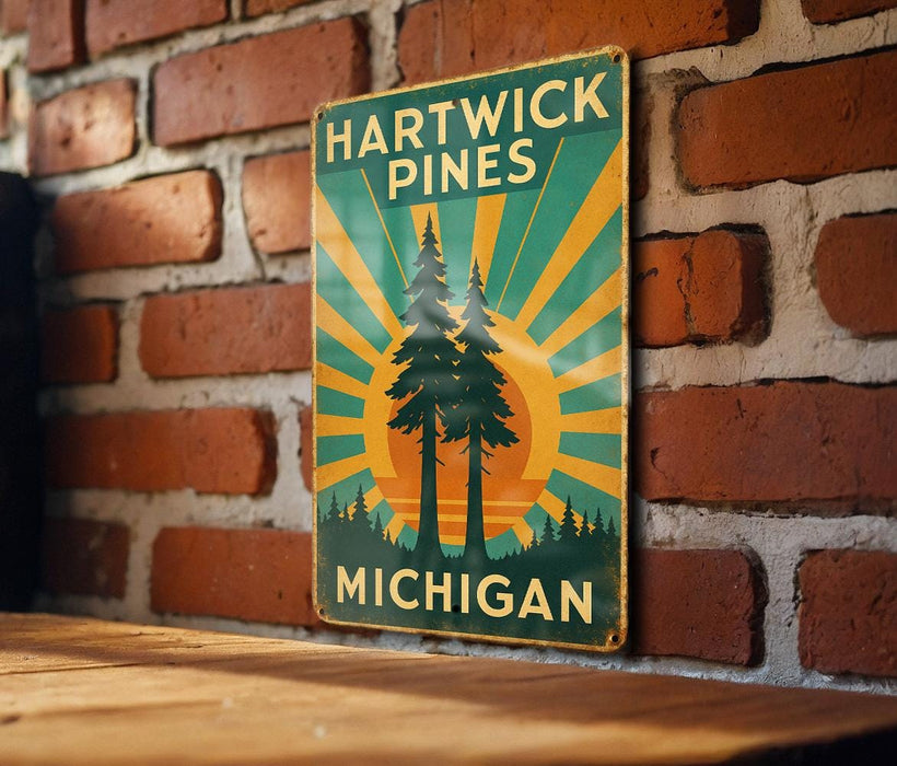 a sign on a brick wall that says hartwick pines michigan
