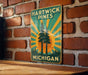 a sign on a brick wall that says hartwick pines michigan