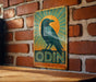 a picture of a bird on a brick wall