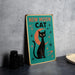 a picture of a black cat sitting on a table
