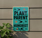 a sign on the side of a building that says plant parent humorist