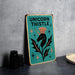 a picture of a sign that says unicorn thistle