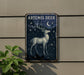 a metal sign with a deer on it