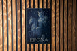 a picture of a woman on a horse on a wooden wall