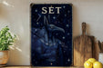 a painting of an egyptian god on a shelf