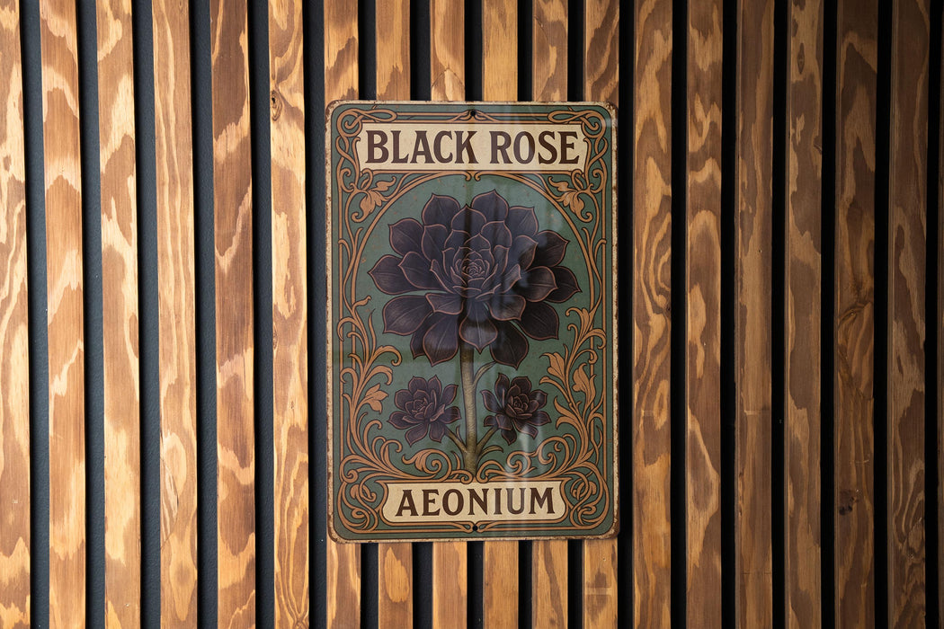 a black rose sign on a wooden wall