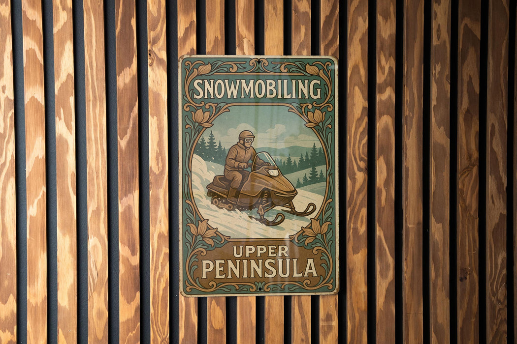 a poster of a man riding a snowmobile