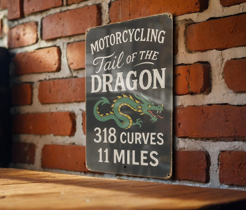 a sign on a brick wall that says motorcycling fall of the dragon
