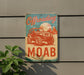 a sign on the side of a building that says offroading moab