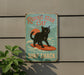 a sign on the side of a building that says rising star cat surf shack
