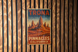 a sign is hanging on a wooden wall