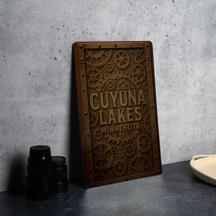 a metal sign sitting on top of a table