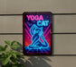 a neon sign on the side of a building