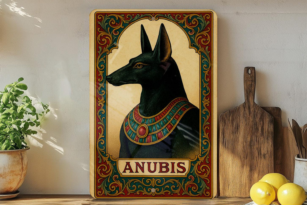 a picture of anubis on a shelf next to a potted plant