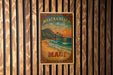 a picture of a sign on a wooden wall